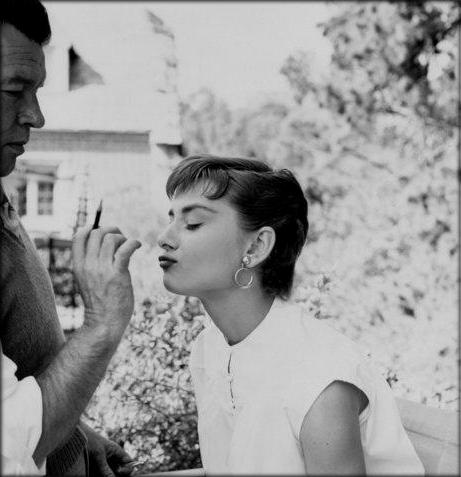 Audrey Hepburn getting her make up on